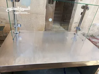  7 طاولات ستانلس وعرباية عصير