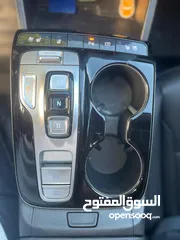  9 هونداي توسان ( هايبرد)  بنزين + كهرباء  فل الفل اضافات