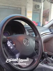  21 مرسيدس للبدل على احدث e200 كرت ابيض 2004