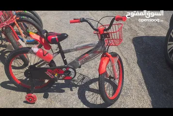  1 دراجة هوائية عادية  للبيع نمره 20 لون احمر  السعر نهائي
