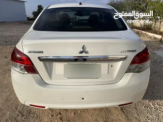  5 متسوبيشي اتراج 2015