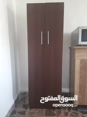  2 خزانة مونة وطاولة شاشة ومايكرويف وخزانة اخدية