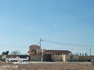  2 ارض للبيع 810متر بعد جسر المطار مقابل محطة المناصير منطقة شاليهات