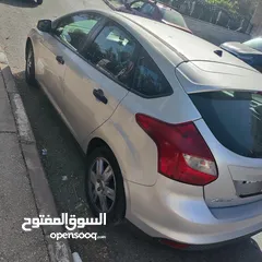  5 فورد فوكس عداد قليل استخدام شخصي يوجد بعض الضربات الخفيفة موديل 2013 هاتش باك