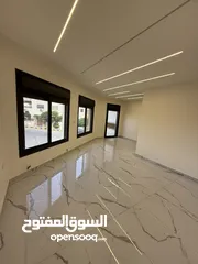  4 شقه طابق ارضي 144متر مع ترس 30 متر للبيع في جبيهه حي المنصور بموقع مميز