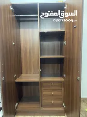  2 Wood cupboard nd dressing table with drawers