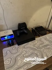  1 PS4 with mousepad and keyboard and 2 controller and everything and a timer