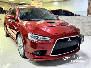  19 ميتسوبيشي لانسر موديل 2015 GT اصلي فحص كامل بحالة الوكاله فل كامل اعلى صنف من فئتها