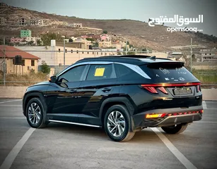  11 هونداي توسان/2022 فل الفل فتحة سقف بانوراما  2x4 ///240Hp بنزين + كهرباء  ( Haybrid) 1600cc