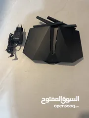  2 Asus 5X4000 Dual Band Wi-Fi Router.