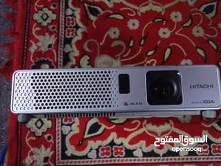  2 بروجكتر هيتاشيVGA موديلcpRx70....2000لومنس به مدخلAV.......VGA