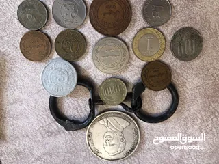  2 اردنية 1980 وعملات اخرى  معدنية ونادرة جدا وثمينة وبعض القطع المعدنية وكلهم