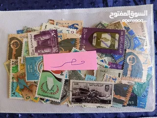  6 طوابع من جميع دول العالم بنص دينار فقط