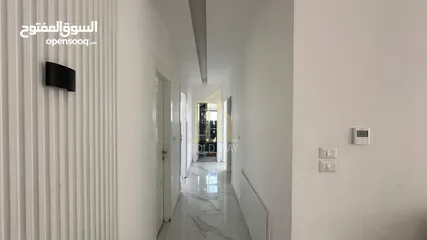  11 في أجمل مناطق الرابيه شقة أرضيه 196م مع ترس 50م بتشطيبات راقية / ref 9547