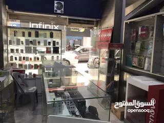  14 محل تجاري للبيع مجهز كامل موقع مميز ملاصق لمعرض شركة زين - شارع باب الواد - الوسط التجاري/ الزرقاء
