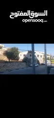  9 قطعه ارض مع بناء للبيع