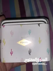  4 ساعة فوسيل سبورت لون اسود مع تاريخ الساعه بحالة ممتازة جداً وعملية للرسمي وللسبور