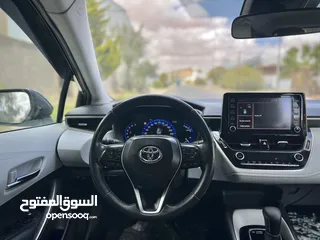  14 تويوتا كورولا  station  2021 هايبرد فحص كامل