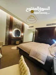  12 For sale in Ajman, in Horizon Towers Ajman, the most elegant and elegant, two rooms and a hall, over