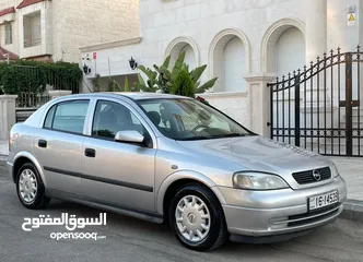  7 ‎أوبل استرا موديل 2001  وارد الوكالة ومالك واحد فقط من الشركة عداد 100الف كيلو فقط