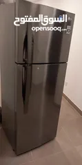  1 LG 2 door fridge 402 liters stainless steel body