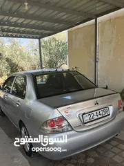  6 ميتسوبيشي 2011Glx
