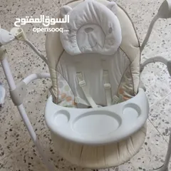  1 مرجيحة بيبي جونيورز  وجهاز تعقيم و تسخين الرضاعات