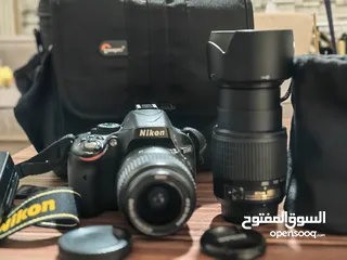 كاميرا نيكون D5100 nikon مع عدسة مكبرة