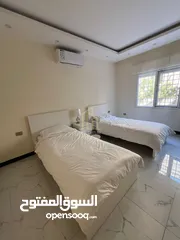  8 شقة مميزة للبيع طابق شبه أرضي 180م داخلي/ 130م خارجي في أجمل مناطق عبدون / ref 9356