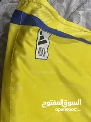  2 قميص نادي النصر السعودي اصلي 100٪ليس عليه شئ طباعة ومن ادداس وعليه ضمان يومان