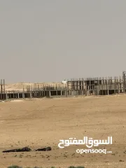  4 ارض في الجيزه على شارعين مقابل مجمع الدوائر