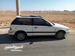  5 متسوبيشي ميراج 1990 ابيض باب واحد