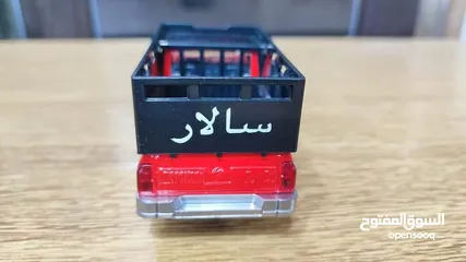  12 مجسم بكم جونيور حديد قياس 1/32 بفتح ابواب وكاله