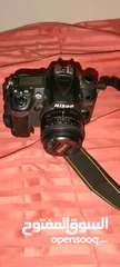  8 Nikon D7000 with 50mm 1.8F lens مع البطارية والشاحن وعدسه شبه جديده