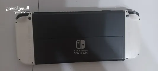  4 Nintendo switch oled معدله مع كامل اغراضها