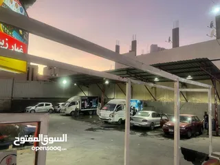  1 محطة غسيل سيارات وبناشر للبيع في عين الباشا