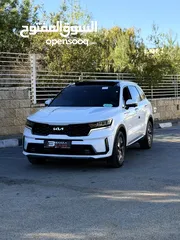  1 كيا سورينتو هايبرد بزنس فل اضافات مع فتحة سقف بانوراما ترخيص 2022/ 240 حصان  بسعر مميز جد 159000 كاش