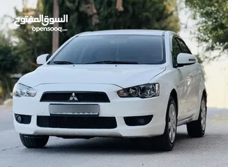  4 ميتسوبيشي لانسر موديل 2015 ماتور 1600 جير اوتماتيك استخدام شخصي