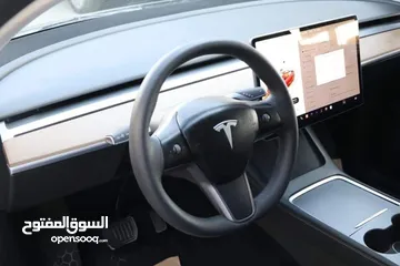  3 Tesla model 3 standard plus داخل ابيض