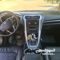  16 فورد فيوجن 2014 هايبرد كلين فحص كامل لون سلفر بحالة الوكالة