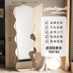  1 مرايا ترند عالمياً... تصميم موجي ومنحوت فخم يخلي أي زاوية تصير قطعة فن جاهزة للتصوير  انعكاس نقي