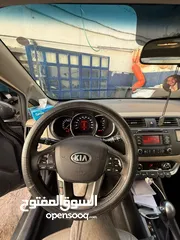  15 كيا ريو هاتشباك 2013