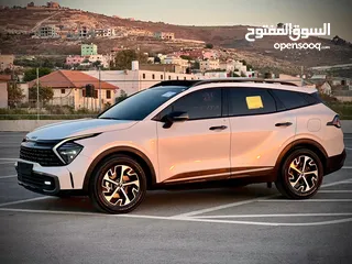  10 كايا سبورتاج /2022 فل الفل فتحة سقف  2x4 ///240Hp بنزين + كهرباء  ( Haybrid) 1600cc