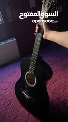  7 جيتار Freeman كلاسيكي اللون الاسود القاتم  للبيع