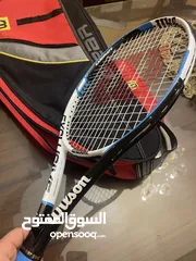  28 كرات تنس إرضي ومضارب