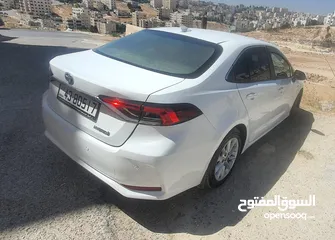  5 تويوتا كورولا 2021 هايبرد  للبيع مواصفات أوروبية سبعة جيد