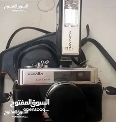  1 كاميرا مينولتا