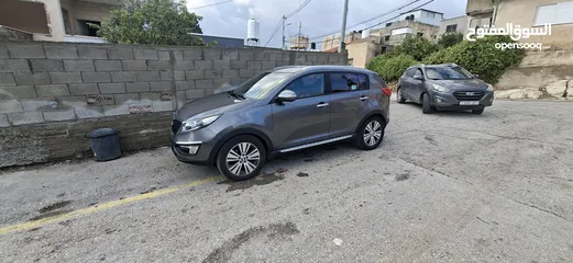  11 جيب كاياسبورتاج موديل 2014-اتومتيك'دفع 4×4 ماتور 2000ديزل فل فل اضافات ماعد الفتحة - نظيف من الاخر