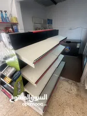  1 ستاند دكانه + 20 رف مع الحماله ب 150 دينار قابل للتفاوض