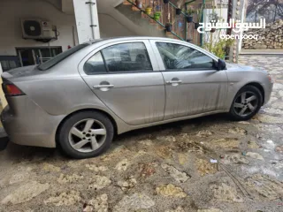  1 ميتسوبيشي لانسر 2012 متور 1600 اتمات